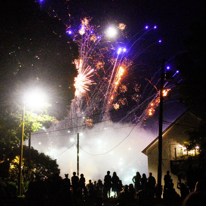 Fireworks over a Louisville estate during a summer celebration